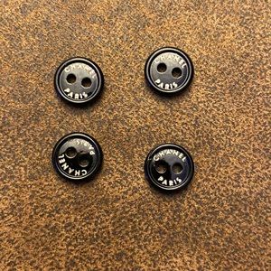 Simple black CHANEL button